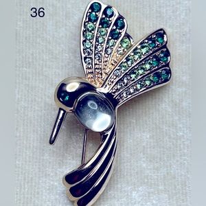 Monet Jelly belly humming bird brooch.